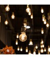 Ampoule LED filament spirale 6W E27 dimmable - G125, verre ambré, 1800K, angle 300°