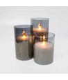 Set de 3 bougies LED sous verre fumé Ø7,5cm, effet flamme - Avec télécommande et minuterie, 10/12,5/15cm de haut, véritable cire