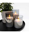 Set de 3 bougies LED sous verre fumé Ø7,5cm, effet flamme - Avec télécommande et minuterie, 10/12,5/15cm de haut, véritable cire